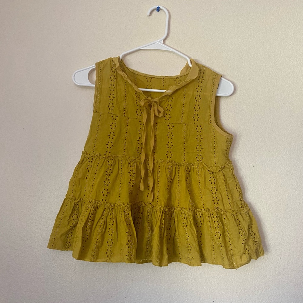 A cute yellow short sleeveless